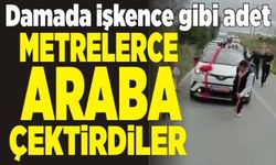 Çıplak ayakla metrelerce gelin arabası çekti