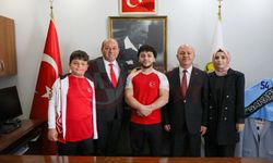 Başkan Ata, şampiyonu ağırladı