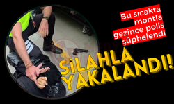 Sıcakta montla gezince polis şüphelendi: Silahla yakalandı!
