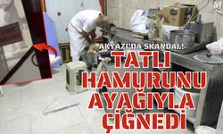 Tatlı hamurunu ayağıyla çiğnedi