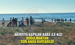 Akıntıya kapılan baba ile kızı az daha boğuluyordu