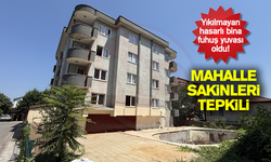 Yıkılmayan hasarlı bina fuhuş yuvası oldu!