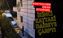 Kontrolden çıkan otomobil ikinci kattaki daireye çarptı