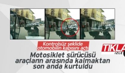 Kontrolsüz açılan kapı motosiklet sürücüsüne çarptı