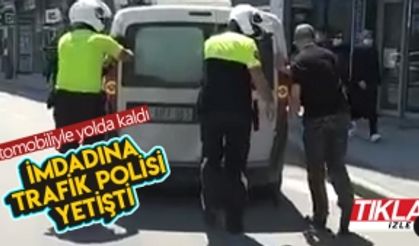 Otomobiliyle yolda kalan sürücünün yardımına polis yetişti