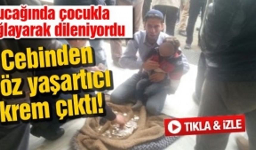 Kucağında çocukla ağlayarak dileniyordu!