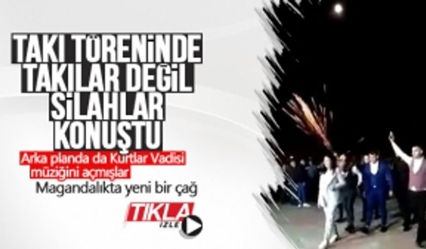 Takı töreninde takılar değil silahlar konuştu