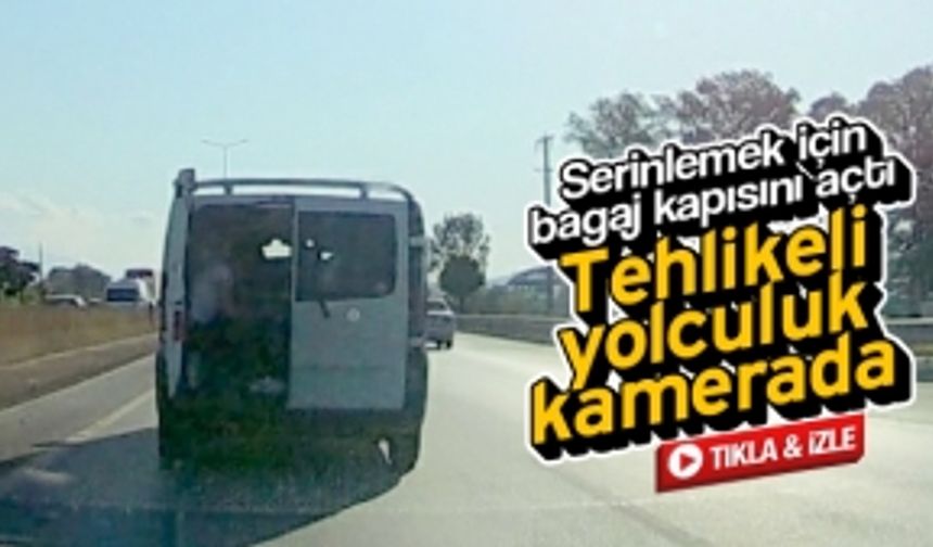 Serinlemek için bagaj kapısını açarak yolculuk etti