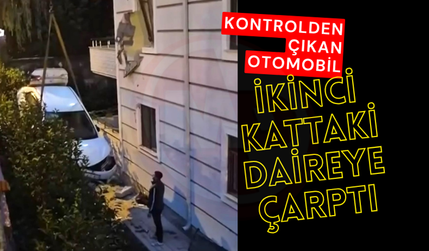 Kontrolden çıkan otomobil ikinci kattaki daireye çarptı